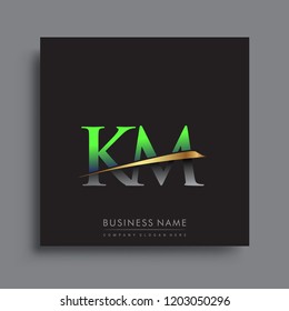 initial letter KM logotype company name colored green and gold swoosh design. vector logo for business and company