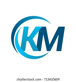 initial letter KM logotype company name blue circle and swoosh design. vector logo for business and company identity.
