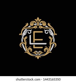 Initial letter L and E, LE, EL, decorative ornament emblem badge, overlapping monogram logo, elegant luxury silver gold color on black background