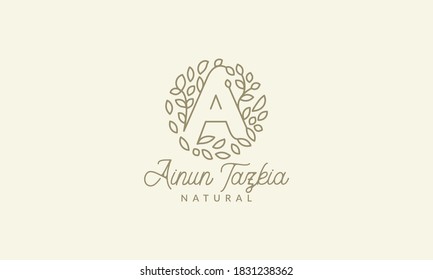 initial A or letter A with leaf plant ornament on circle luxury vintage logo vector icon illustration design 