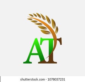 initial letter logo AT, Agriculture wheat Logo Template vector icon design colored green and brown.