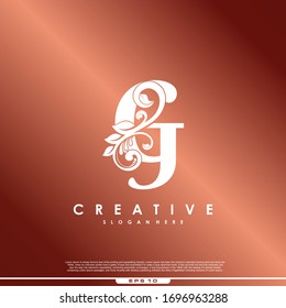La letra inicial logo G la belleza lujosa florece.