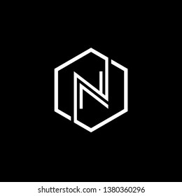 Initial letter logo N inside hexagon shape uppercase black monogram logo template