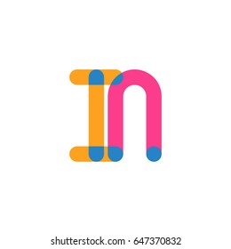 Initial letter logo IN overlapping round line, yellow blue magenta