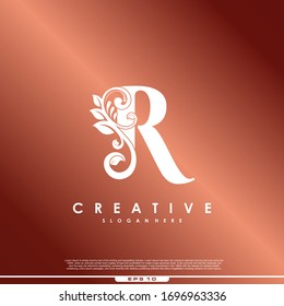 Initial letter logo R luxury beauty flourishes.