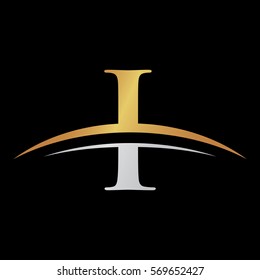 initial letter logo with swoosh silver gold