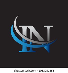initial letter IN logotype company name colored blue and grey swoosh design. vector logo for business and company identity.