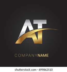initial letter AT logotype company name colored gold and silver swoosh design. isolated on black background.