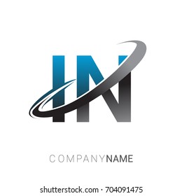initial letter IN logotype company name colored blue and grey swoosh design. logo design for business and company identity.