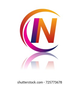 initial letter IN logotype company name orange and magenta color on circle and swoosh design. vector logo for business and company identity.