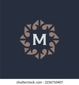 Initial letter M abstract floral logo with heart monogram icon in elegant style