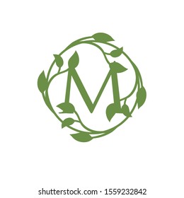 initial letter M with circle green leaf vector illustration