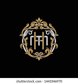 Initial letter M and H, MH, HM, decorative ornament emblem badge, overlapping monogram logo, elegant luxury silver gold color on black background