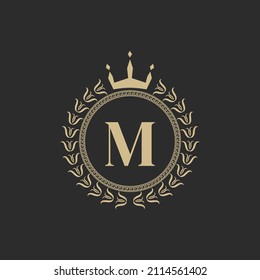 Initial Letter M Heraldic Royal Frame with Crown and Laurel Wreath. Simple Classic Emblem. Round Composition. Graphics Style. Art Elements for Logo Design Vector Illustration