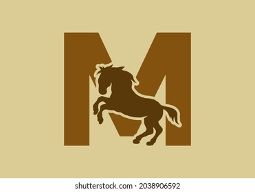 Initial letter M with horse shape design