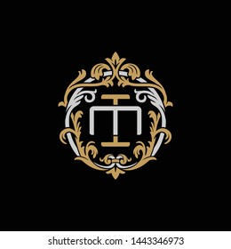 Initial letter M and I, MI, IM, decorative ornament emblem badge, overlapping monogram logo, elegant luxury silver gold color on black background