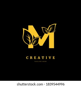 Initial letter M with leaf logo vector concept element, letter M logo with Organic leaf. Fit for company, product label, badge, or business.