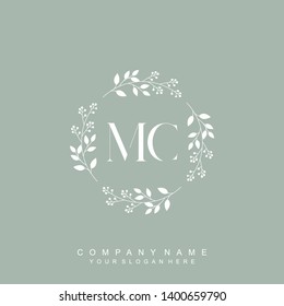 Initial letter MC beautiful handwriting logo vector template
