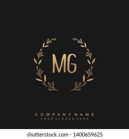 Initial letter MG beautiful handwriting logo vector template
