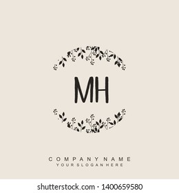 Initial letter MH beautiful handwriting logo vector template