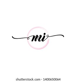 Initial letter MI beautiful handwriting logo vector template