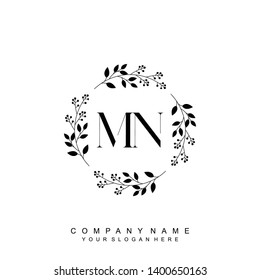 Initial letter MN beautiful handwriting logo vector template