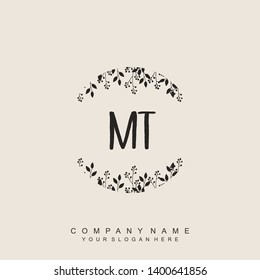 Initial letter MT beautiful handwriting logo vector template