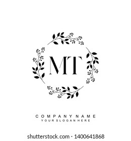 Initial letter MT beautiful handwriting logo vector template