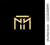 Initial letter MT TM minimalist art logo, gold color on black background.