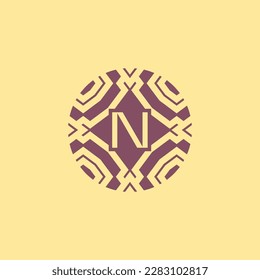 Initial letter N circle frame unique tribe pattern logo