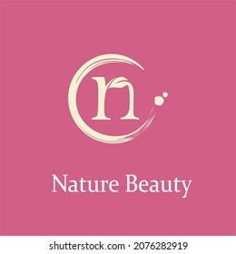 Initial Letter n with Leaf and Circle Brush Splash for Feminine Nature Beauty Spa Aesthetic Salon  Business Logo Idea