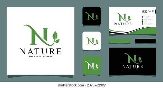 Initial letter N with leaf luxury logo. green leaf logo with business card design template