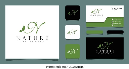 Initial letter N with leaf luxury logo. green leaf logo with business card design template