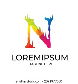 letra inicial N logo en minúscula ligado rosa azul violeta