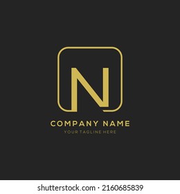Initial letter N logo design vector dark concept with golden square element. N letter logo design.