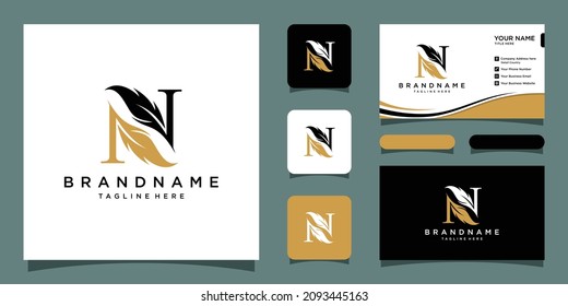 Initial letter N logo with Feather Luxury gold design template