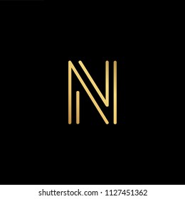 Initial letter N NN minimalist art logo, gold color on black background