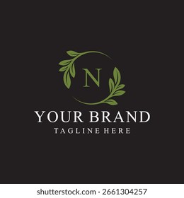 Initial letter N serif font logo design, green leaves nature graphic icon concept