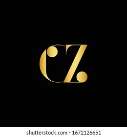 initial letter OZ logotype company name colored gold design. isolated on black background.
