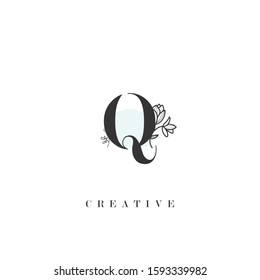 initial letter Q logo with hand drawn flower element. design vector illustration symbol template