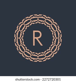 initial letter R ornamental emblem frame circle pattern logo