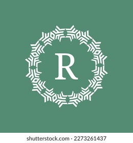 initial letter R ornamental futuristic circle pattern frame emblem logo