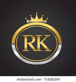 initial letter RK logotype company name with oval shape and crown, gold and silver color. vector logo for business and company identity.