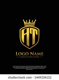 initial AT letter with shield style logo template vector