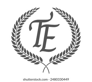 Initial letter T and E, TE monogram logo design with laurel wreath. Luxury calligraphy font.