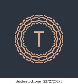 initial letter T ornamental emblem frame circle pattern logo