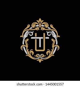 Initial letter T and U, TU, UT, decorative ornament emblem badge, overlapping monogram logo, elegant luxury silver gold color on black background
