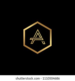 Initial letter AT TA minimalist art monogram Hexagon shape logo, gold color on black background