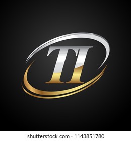 initial letter TI logotype company name colored gold and silver swoosh design. isolated on black background.