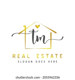 Letra inicial TM caligrafía manuscrita Concepto del logotipo inmobiliario. Alfabeto escrito a mano en la plantilla de logotipo. Letras y alfabeto para el diseño de su logotipo.